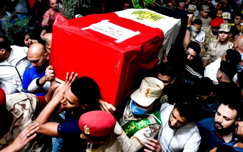 Men carry the coffin of Egyptian soldier Ahmed Mohamed Ahmed Ali during his funeral service in Qalyubia, Egypt, on May 8, 2022. AP Photo/Sayed Hassan