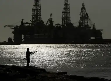 Docked oil drilling platforms seen in May 2020 in Port Aransas, Tex. (Eric Gay/AP)