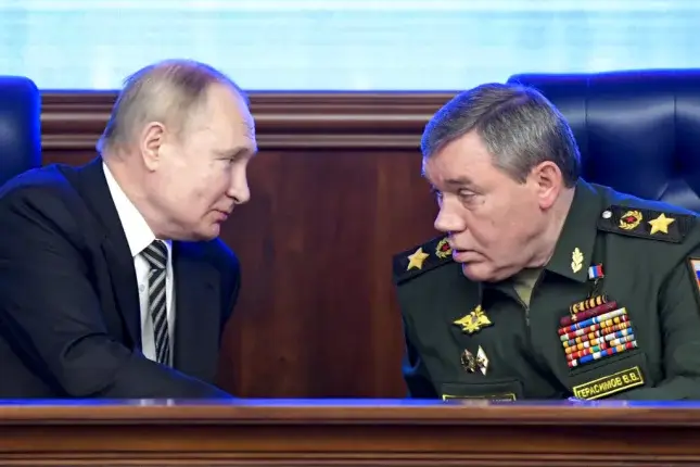Russian President Vladimir Putin and Russian General Staff Valery Gerasimov in Moscow, Russia, Tuesday, Dec. 21, 2021. (Sergei Guneyev/AP)