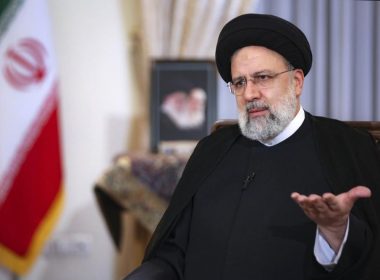 In this photo released by the official website of the office of the Iranian Presidency, President Ebrahim Raisi speaks in a live interview with state-run TV, at the presidency office in Tehran, Iran, Monday, May 9, 2022. Raisi said the country is exporting twice as much oil as when he took office in August, despite heavy sanctions on oil exports imposed by the U.S. (Iranian Presidency Office via AP)