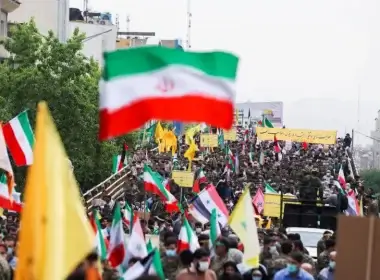 Iranians hold flags during a rally marking the annual Quds Day, or Jerusalem Day, on the last Friday of the holy month of Ramadan in Tehran, Iran April 29, 2022 (photo credit: WANA NEWS AGENCY/REUTERS)