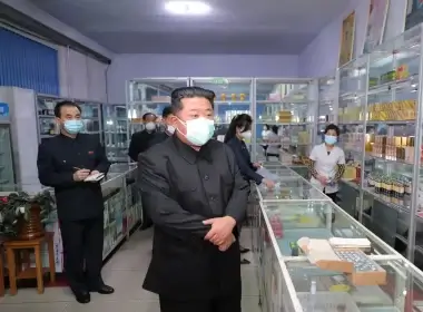 North Korean leader Kim Jong Un wears a face mask amid the Covid outbreak, while inspecting a pharmacy in Pyongyang. KCNA via Reuters