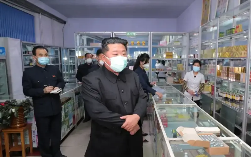 North Korean leader Kim Jong Un wears a face mask amid the Covid outbreak, while inspecting a pharmacy in Pyongyang. KCNA via Reuters
