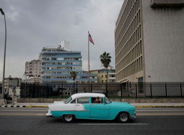 A vintage car passes by the U.S. Embassy in Havana, Cuba, October 30, 2020. Picture taken October 30, 2020. REUTERS/Alexandre Meneghini/File Photo