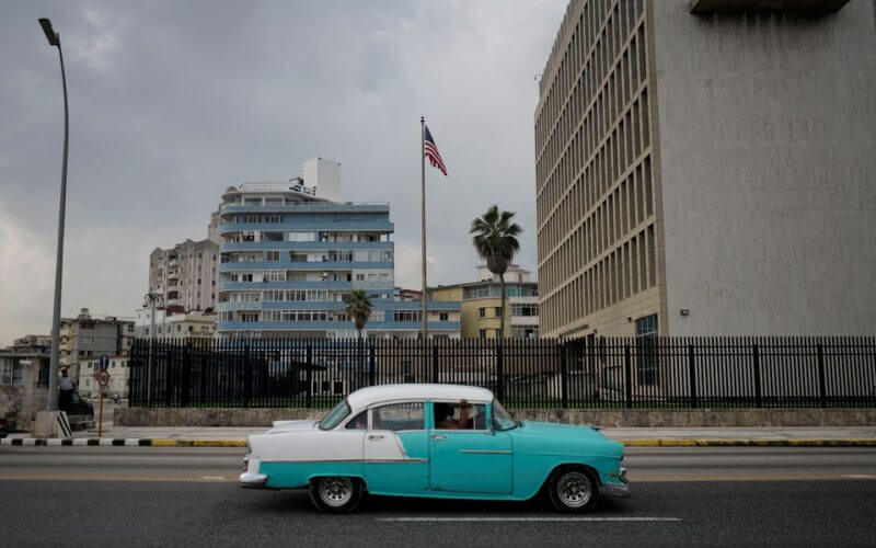 A vintage car passes by the U.S. Embassy in Havana, Cuba, October 30, 2020. Picture taken October 30, 2020. REUTERS/Alexandre Meneghini/File Photo