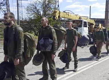 In this photo taken from video released by the Russian Defense Ministry on Friday, May 20, 2022, Ukrainian servicemen are pictured as they leave the besieged Azovstal steel plant in Mariupol, in territory under the government of the Donetsk People's Republic, eastern Ukraine. (Russian Defense Ministry Press Service via AP)