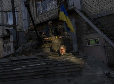 Ukrainian servicemen park a Russian BMP-2, an infantry combat vehicle, in the Kharkiv area, eastern Ukraine, Sunday, May 29, 2022. (AP Photo/Bernat Armangue)