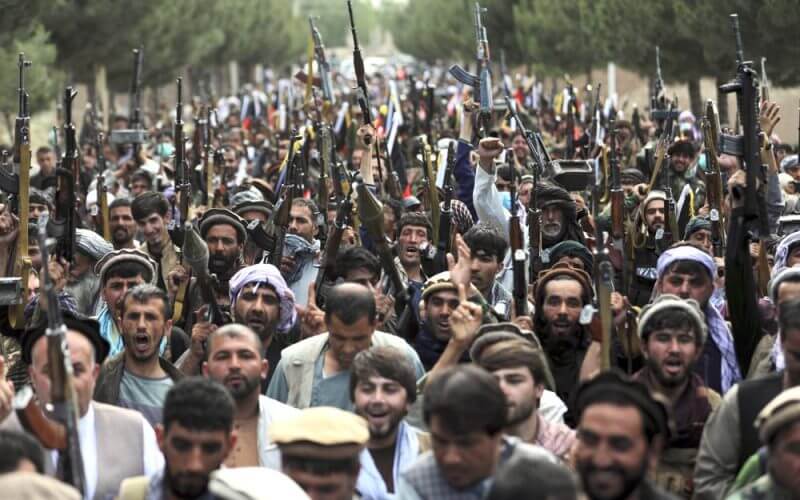 Afghan militiamen join Afghan defense and security forces during a gathering in Kabul, Afghanistan, on June 23, 2021. (AP Photo/Rahmat Gul, File)