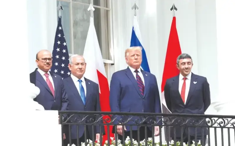 BAHRAIN’S FOREIGN MINISTER Abdullatif Al Zayani (left), Prime Minister Benjamin Netanyahu, US President Donald Trump and UAE Foreign Minister Abdullah bin Zayed gather on the balcony of the White House on Tuesday before the signing of the Abraham Accord. (photo credit: TOM BRENNER/REUTERS)
