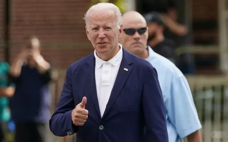 U.S. President Joe Biden gives a thumbs up as he departs church in Wilmington, Delaware, U.S. June 12, 2022. REUTERS/Kevin Lamarque