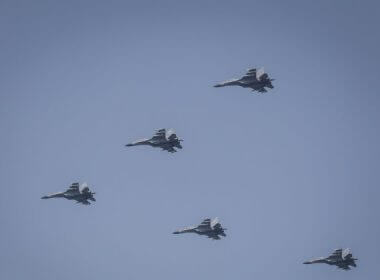 Planes from the Chinese People's Liberation Army (PLA) air force fly in formation in Beijing on Oct. 1, 2019. (Wang He/Getty Images)