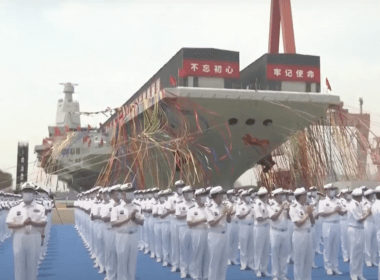 China unveiled its third aircraft carrier, Fujian, at its Shanghai harbor on Friday, according to Chinese state-run media. [Screenshot/YouTube/SouthChinaMorningPost]