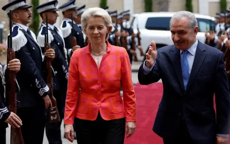 President of the European Commission Ursula von der Leyen is welcomed by Palestinian Prime Minister Mohammad Shtayyeh in Ramallah, June 14, 2022. (photo credit: REUTERS/MOHAMAD TOROKMAN)