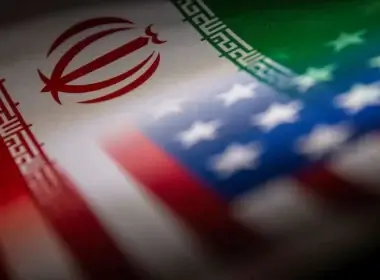 Iran's and U.S.' flags are seen printed on paper in this illustration taken January 27, 2022. REUTERS/Dado Ruvic/Illustration