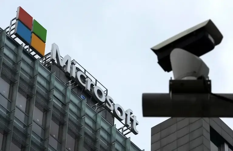 A security surveillance camera is seen near the Microsoft office building in Beijing, July 20, 2021. Coinciding with unrelenting cyberattacks against... (AP Photo/Andy Wong, File)