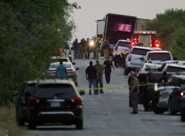 Police and other first responders work the scene where officials say dozens of people have been found dead and multiple others were taken to hospitals with heat-related illnesses after a semitrailer containing suspected migrants was found, Monday, June 27, 2022, in San Antonio. (AP Photo/Eric Gay)