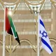 Flags of United Arab Emirates and Israel flutter during Israel's National Day ceremony at Expo 2020 Dubai, in Dubai (photo credit: REUTERS/CHRISTOPHER PIKE)