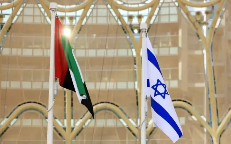 Flags of United Arab Emirates and Israel flutter during Israel's National Day ceremony at Expo 2020 Dubai, in Dubai (photo credit: REUTERS/CHRISTOPHER PIKE)