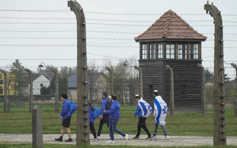 Jewish people visit the Auschwitz Nazi concentration camp after the March of the Living annual observance, in Oswiecim, Poland, April 28, 2022. (AP Photo/Czarek Sokolowski, File)