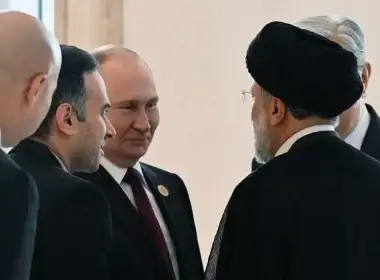 Russian President Vladimir Putin and Iranian President Ebrahim Raisi speak at the Caspian Summit in Ashgabat, Turkmenistan, on Wednesday. (photo credit: SPUTNIK/GRIGORY SYSOYEV/REUTERS)