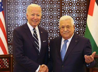 President Biden shakes hands with Palestinian President Mahmoud Abbas. Photo: Palestinian Presidency/Handout/Anadolu Agency via Getty Images