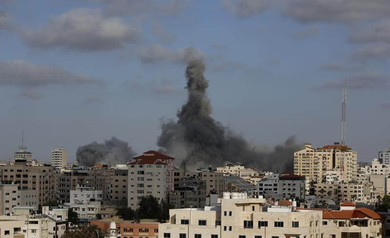 An Israeli air strike hits a building in Gaza City, May 17, 2021. (AP Photo/Hatem Moussa, File)