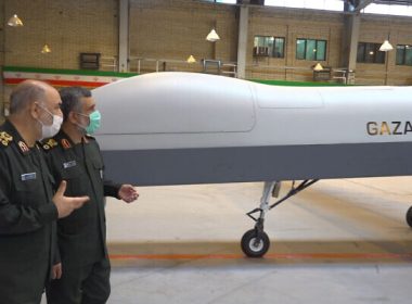 Iranian Revolutionary Guard Commander Gen. Hossein Salami, left, and the Guard's aerospace division commander Gen. Amir Ali Hajizadeh talk while unveiling a new drone called 'Gaza,' in an undisclosed location in Iran, in a photo released on May 22, 2021. (Sepahnews of the Iranian Revolutionary Guard, via AP)