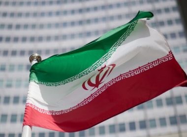 The flag of Iran in front of the building of the International Atomic Energy Agency (IAEA) Headquarters ahead of a press conference by Rafael Grossi, Director General of the IAEA, about the agency's monitoring of Iran's nuclear energy program in Vienna on May 24, 2021. (Michael Gruber/Getty Images)