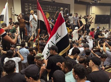 Iraqi protesters demonstrate inside the country's parliament in Baghdad, Iraq, Wednesday, July. 27, 2022. (AP/Ali Jabar)