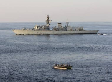 This image of HMS Montrose and a small boarding craft with British sailors was released by the British Ministry of Defence to illustrate two weapons smuggling interdiction missions against Iranian vessels in early 2022. (British MOD photo)