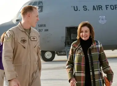 Col. Ben Jonsson, 379th Air Expeditionary Wing vice commander, greets Speaker of the U.S. House of Representatives Nancy Pelosi during a congressional delegation visit at Al Udeid Air Base, Qatar on Oct. 21, 2019. (Tech. Sgt. John Wilkes/U.S. Air Force).