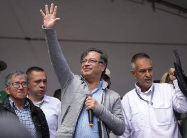 Gustavo Petro waves at supporters during a closing campaign rally in Zipaquira, Colombia, (AP Photo/Fernando Vergara, File) May 22, 2022.
