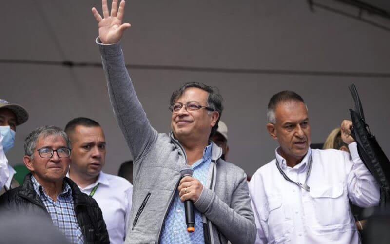 Gustavo Petro waves at supporters during a closing campaign rally in Zipaquira, Colombia, (AP Photo/Fernando Vergara, File) May 22, 2022.