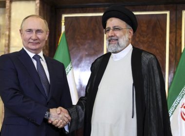 Russian President Vladimir Putin, left, and Iranian President Ebrahim Raisi pose for a photo prior to their talks at the Saadabad palace, in Tehran, Iran, Tuesday, July 19, 2022. (Sergei Savostyanov, Sputnik, Kremlin Pool Photo via AP)