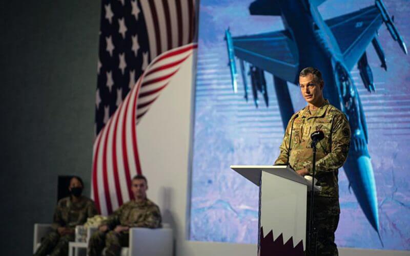 This image provided by the U.S. Air Force shows U.S. Air Force Lt. Gen. Alexus G. Grynkewich, incoming Ninth Air Force (Air Forces Central) commander, delivering a commemorative speech during a change of command ceremony at al-Udeid Air Base, Qatar, Thursday, July 21, 2022. (Staff Sgt. Draeke Layman/U.S. Air Force via AP)