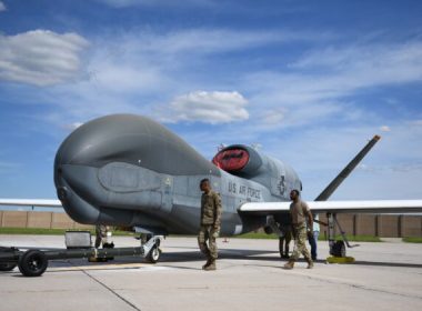 Airmen assigned to the 319th Aircraft Maintenance Squadron from Grand Forks Air Force Base, North Dakota, perform a maintenance check on a drone on June 6, 2022. (U.S. Air Force photo by Senior Airman Ashley Richards)