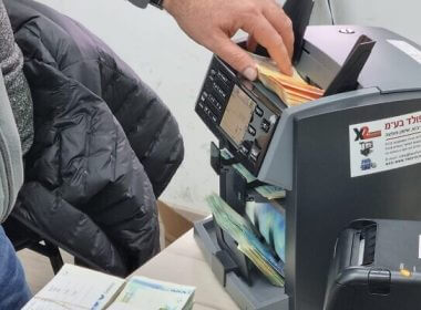 Illustrative: Cash confiscated from an East Jerusalem charity, with alleged ties to Hamas, in February 2022. (Israel Police)