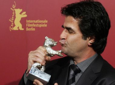 Iranian director Jafar Panahi poses with his Silver Berlin Bear award at the 56th Berlinale International Film Festival in Berlin, Feb. 18, 2006. (AP Photo/Arnd Wiegmann, Pool, File)