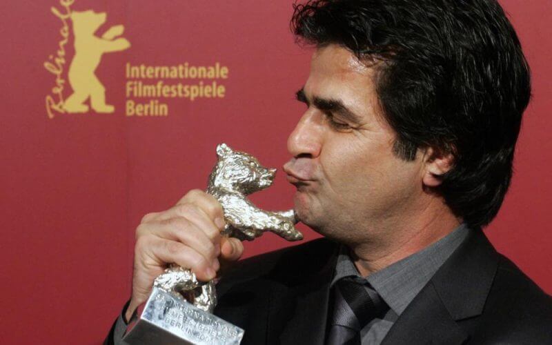Iranian director Jafar Panahi poses with his Silver Berlin Bear award at the 56th Berlinale International Film Festival in Berlin, Feb. 18, 2006. (AP Photo/Arnd Wiegmann, Pool, File)