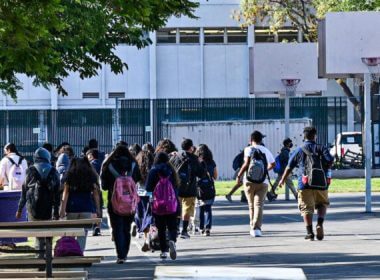 Students walk to their classrooms at a public middle school in Los Angeles, California, on Sept. 10, 2021. (Robyn Beck/AFP via Getty Images)