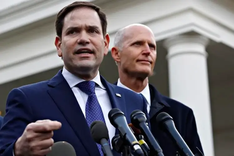 Florida U.S. Sens. Marco Rubio (left) and Rick Scott. Jacquelyn Martin / AP