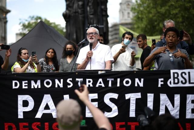 Former leader of Britain's opposition Labour Party, Jeremy Corbyn, delivers a speech during a pro-Palestine demonstration outside Downing Street in London, Britain, June 12, 2021. (Photo: REUTERS/Henry Nicholls)