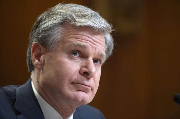 Director of the Federal Bureau of Investigation Christopher Wray testifies during a Senate Appropriations Subcommittee hearing on the fiscal year 2023 budget for the FBI in Washington, May 25, 2022. (Bonnie Cash/Pool Photo via AP, File)
