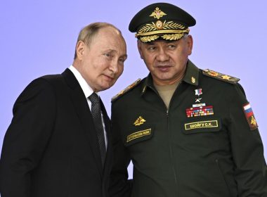 Russia's President Vladimir Putin and Russian Defense Minister Sergei Shoigu attend the opening of the Army 2022 International Military and Technical Forum in the Patriot Park outside Moscow, Russia, Monday, Aug. 15, 2022. AP