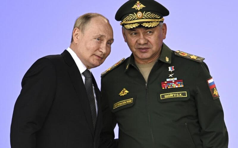 Russia's President Vladimir Putin and Russian Defense Minister Sergei Shoigu attend the opening of the Army 2022 International Military and Technical Forum in the Patriot Park outside Moscow, Russia, Monday, Aug. 15, 2022. AP