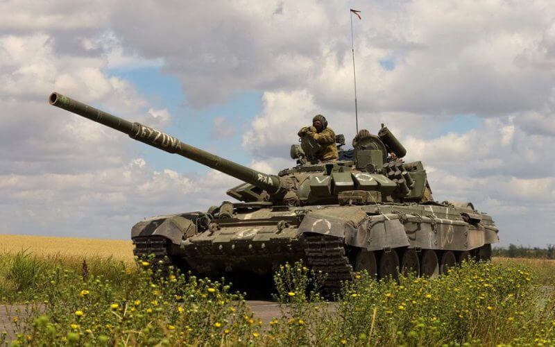 A tank of Russian troops drives in Russian-held part of Zaporizhzhia region, Ukraine, July 23, 2022. REUTERS/Alexander Ermochenko/File Photo