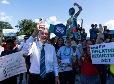 Sen. Ed Markey, D-Mass., shoots a selfie video with climate activists outside the Capitol after the Senate passed the Inflation Reduction Act on Sunday, August 7, 2022. Getty