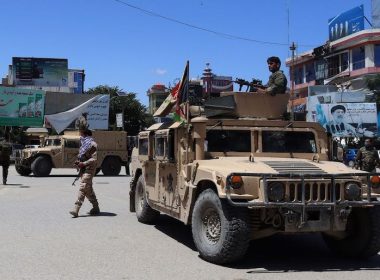 Afghan security forces sit in a Humvee amid ongoing fighting with Taliban militants. Getty Images