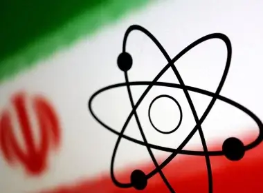 The atomic symbol and the Iranian flag are seen in this illustration, July 21, 2022. REUTERS/Dado Ruvic/Illustration