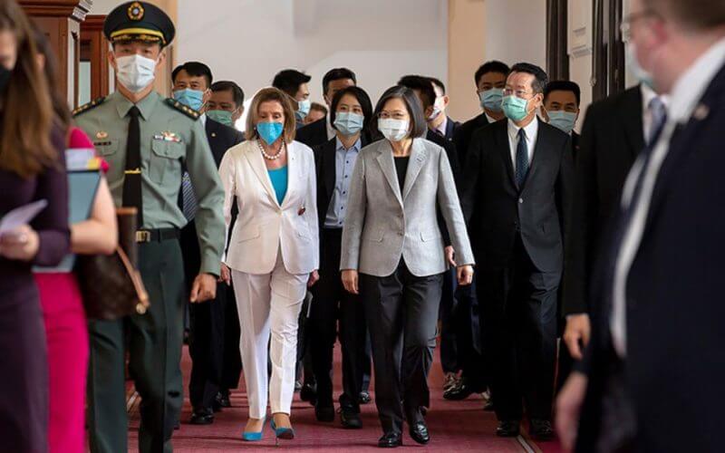 US House Speaker Nancy Pelosi, center left, and Taiwanese President President Tsai Ing-wen arrive for a meeting in Taipei, Taiwan, Wednesday, August 3. (Taiwan Presidential Office/AP)